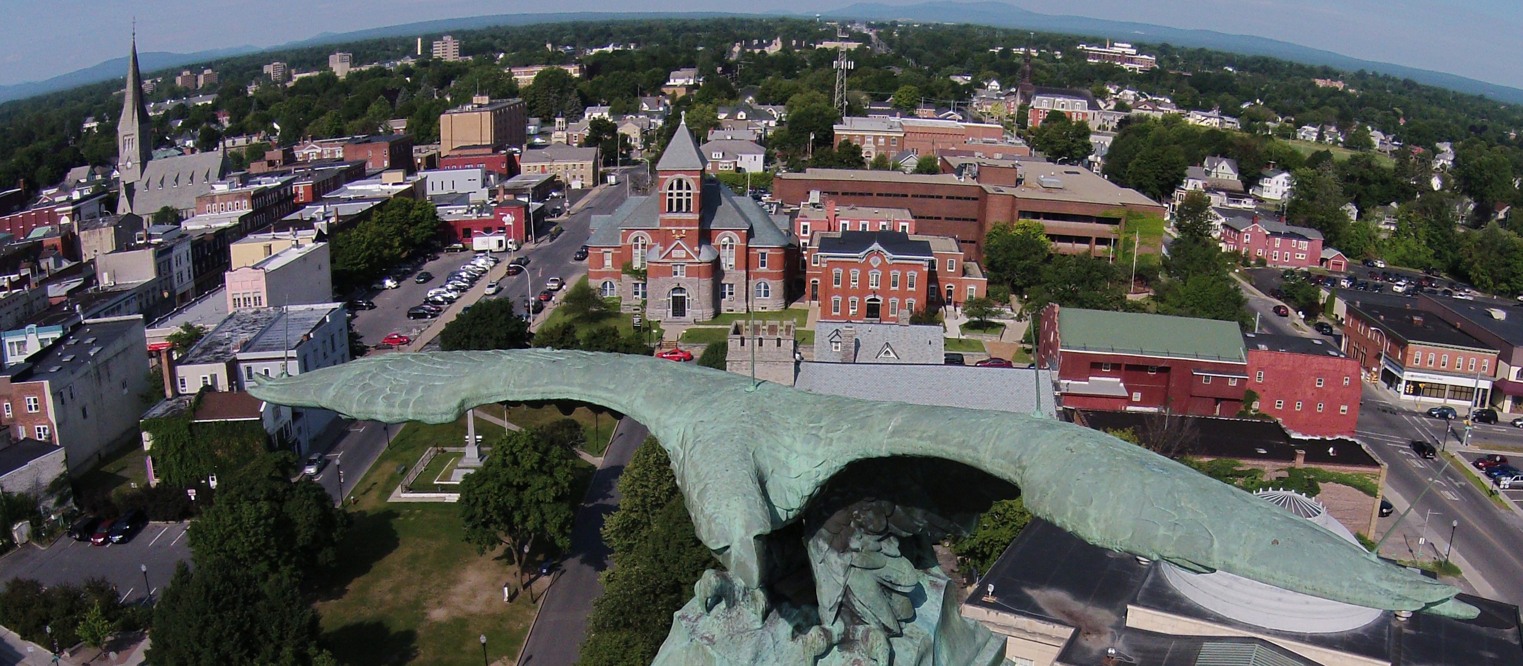 A drone angle of the MacDonough Monument with the Health Department seen in the background.