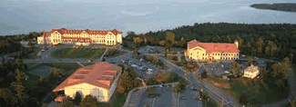 Ariel view of Clinton Community College buildings and lake champlain