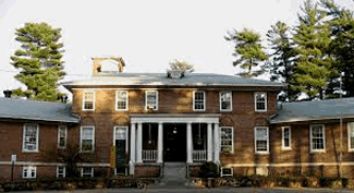 North Country Community College front of main brick building with pillars